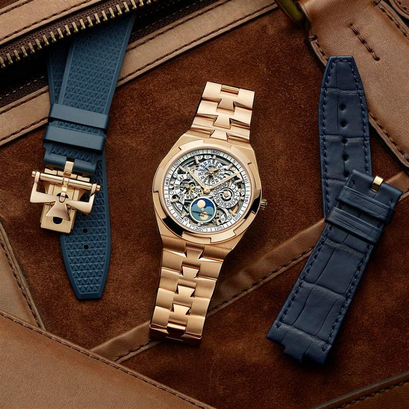 玫瑰金 Vacheron Constantin 手表，皮革背景，旁邊有兩條表帶